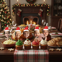 Christmas-themed table setting with cupcakes and faces on top, decorated room with tree and fireplace.